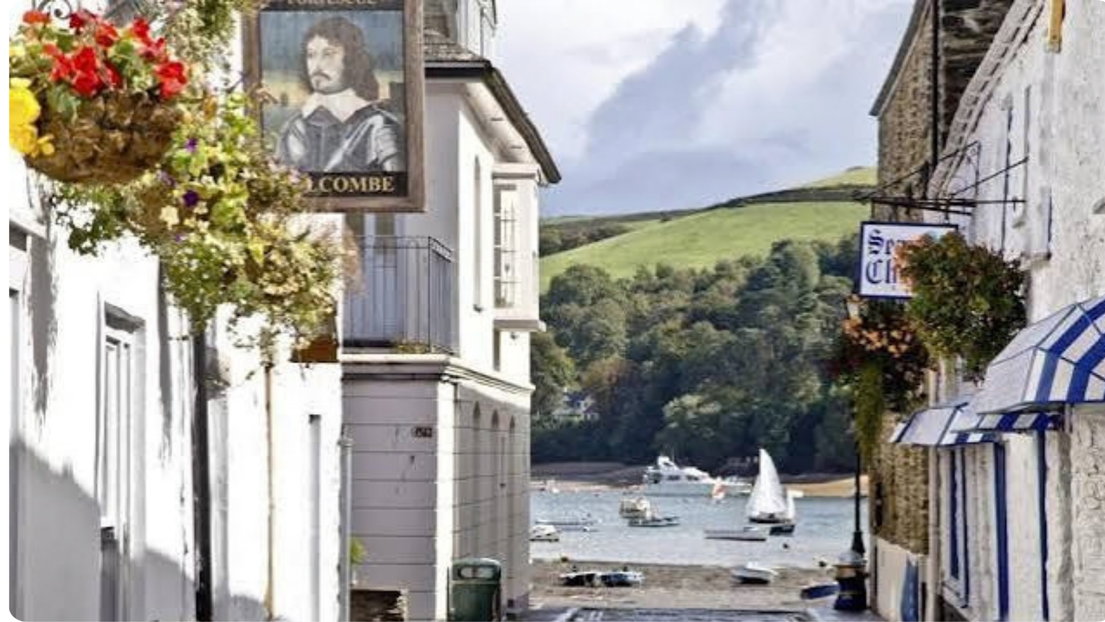 View down a Salcombe lane towards boats on the estuary